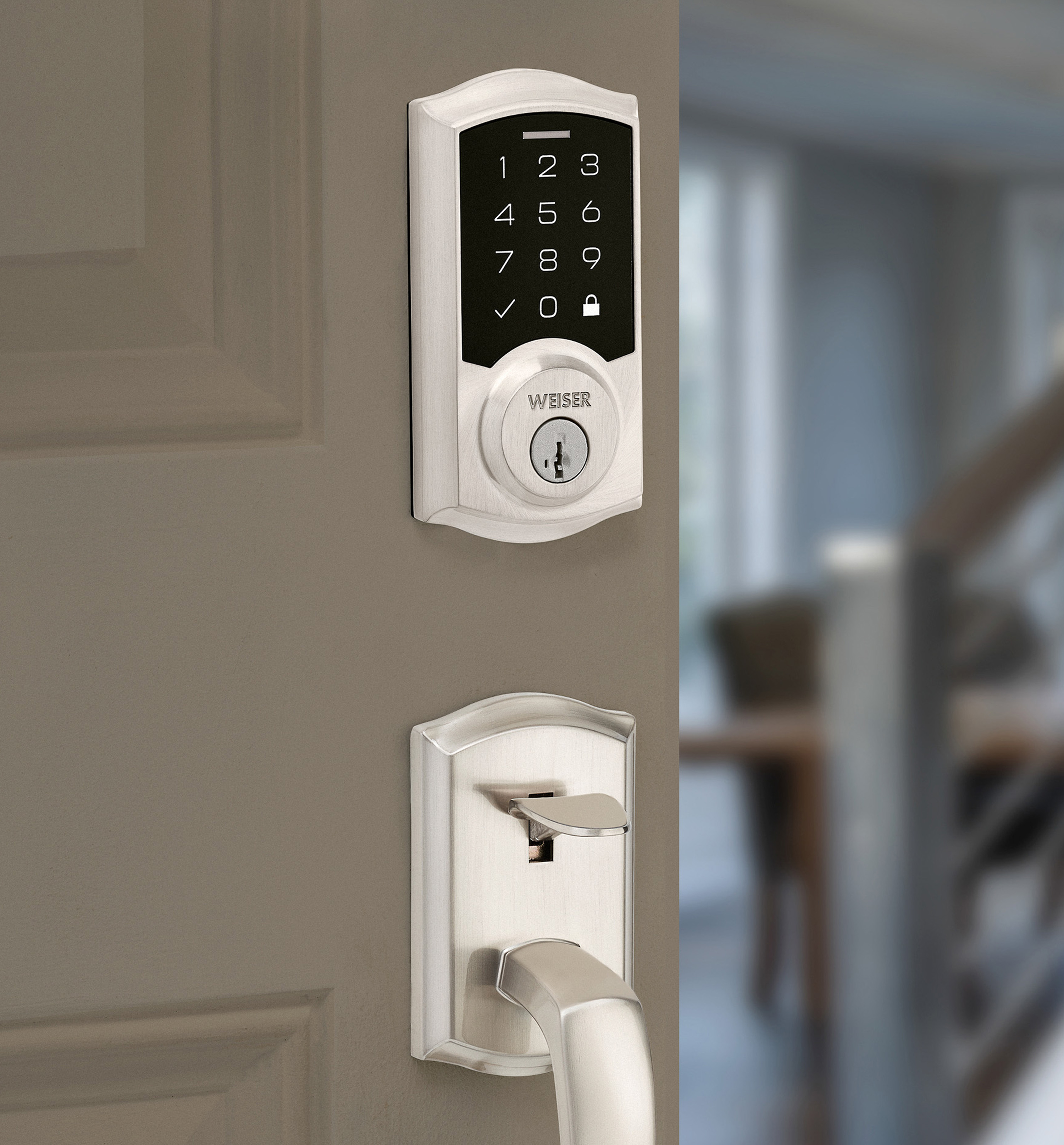 Smartcode Touch electronic lock featuring smartkey in satin nickel lifestyle
